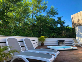 Maison charmante à Les Trois-Îlets avec jacuzzi